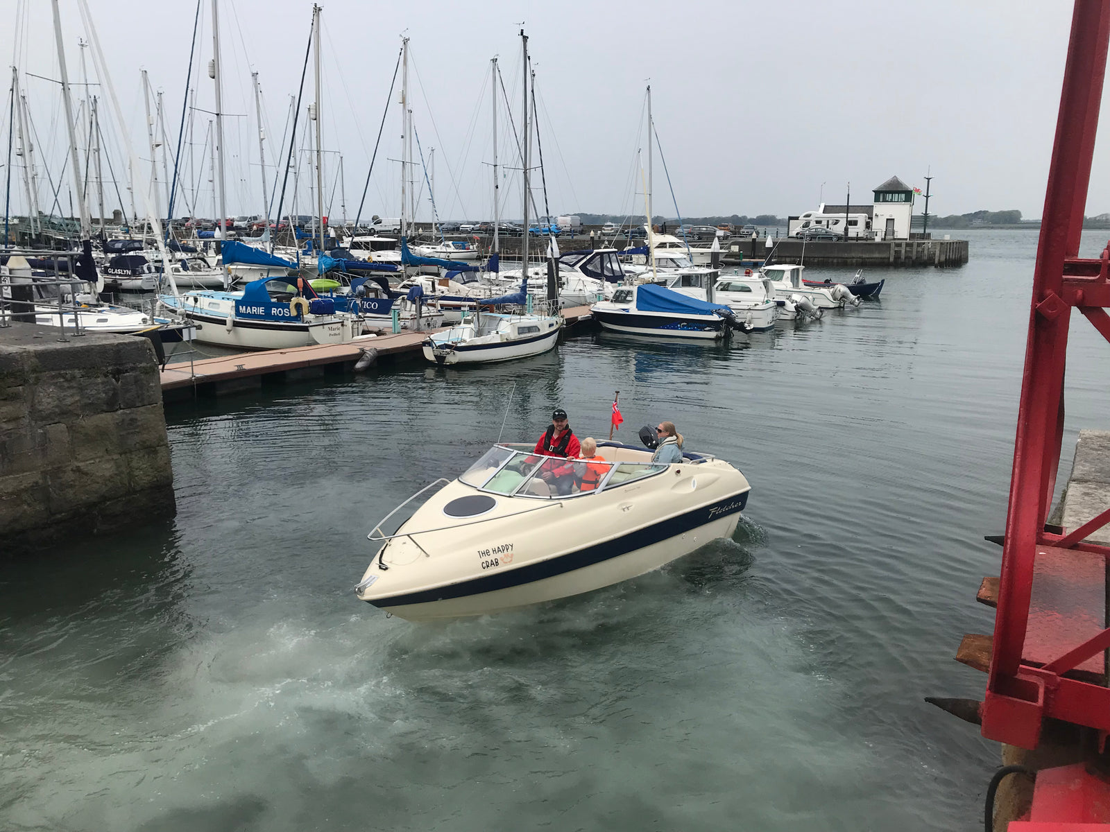 Red power boat on the water